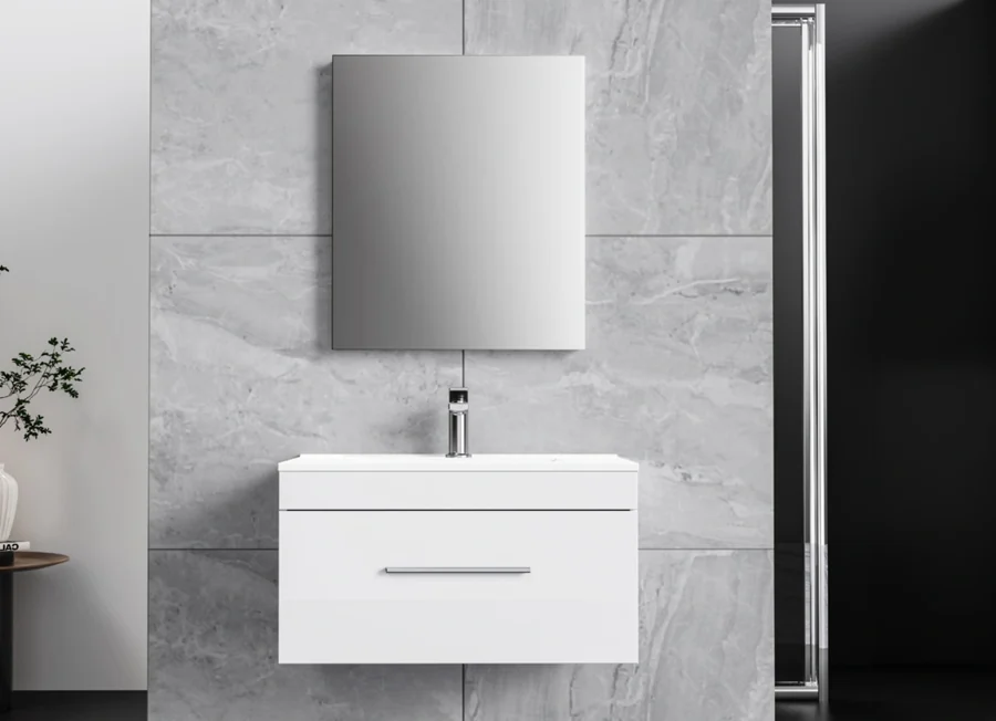 White wall-mounted vanity with a rectangular mirror against grey stone tiles
